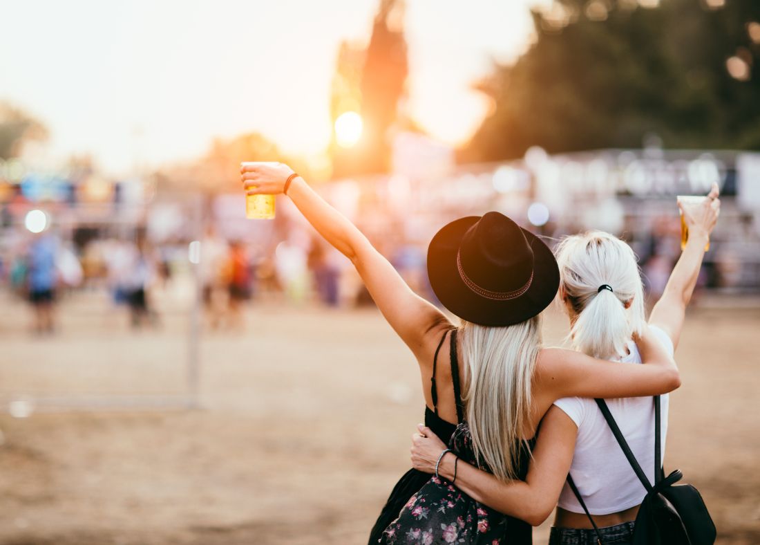 two people at a summer festival