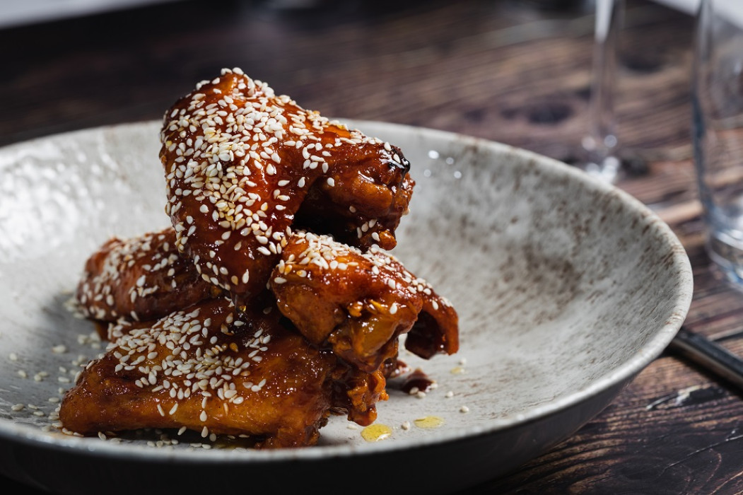 photo of chicken wings with sesame seeds