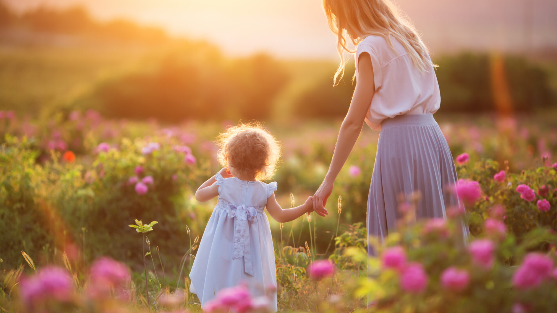 shutterstock 659201914 mothers day mother daughter flowers field - Glenroyal Hotel